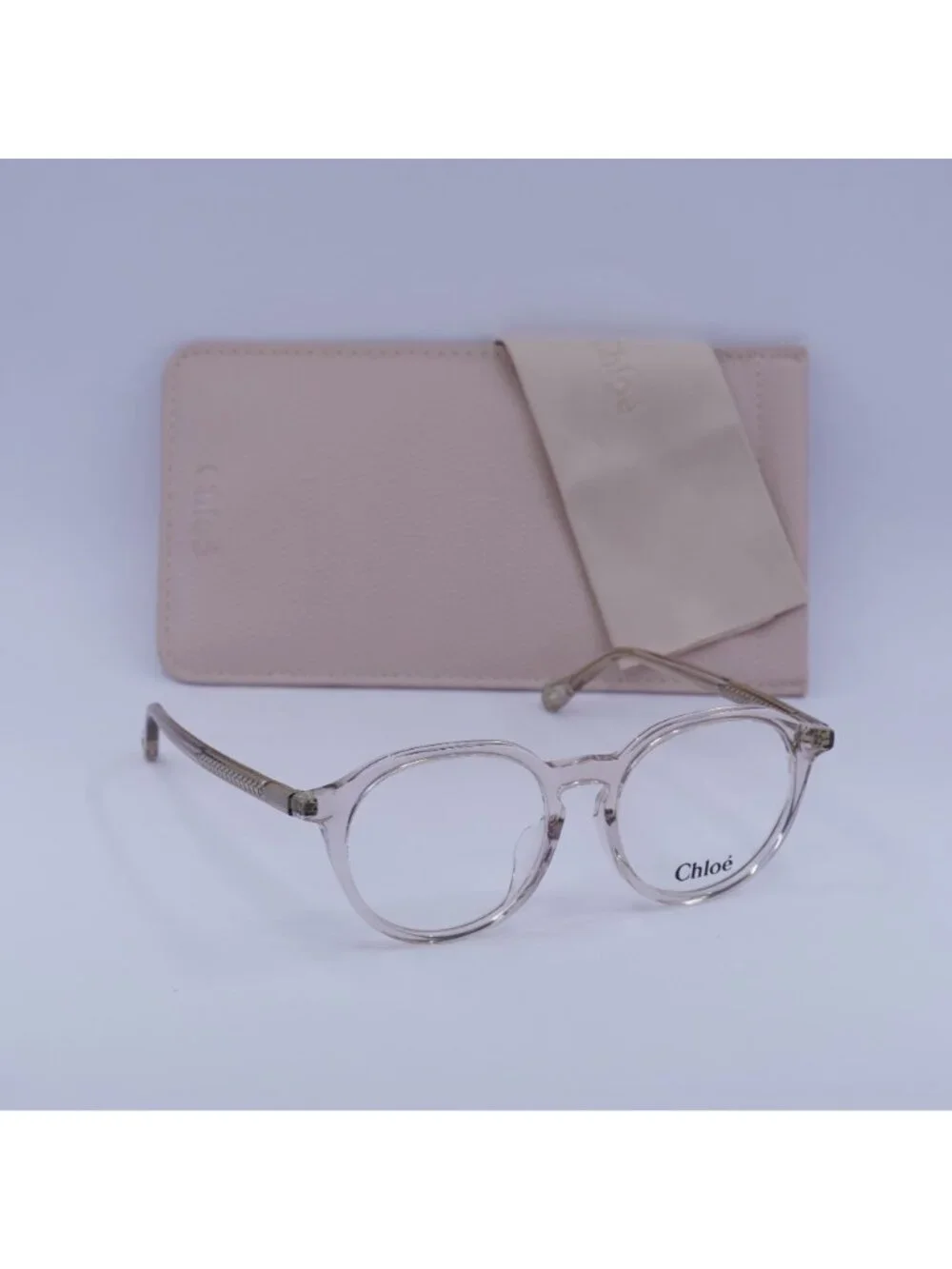 Chloe CH0012OA 001 Round Eyeglasses 50mm - Transparent Pink